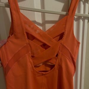 Lululemon Athletica Rise and Flow Tank Size 6. Beautiful mesh crisscross back